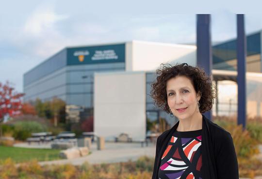 Marina Mourtzakis in front of Toby Jenkins Applied Health Research Building.