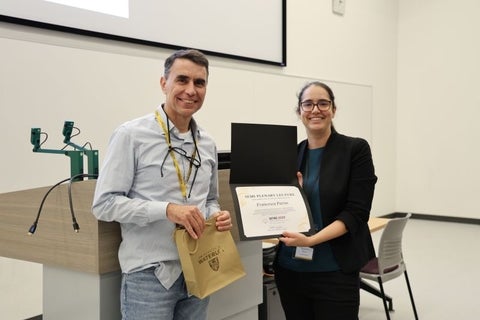 man and women with a award