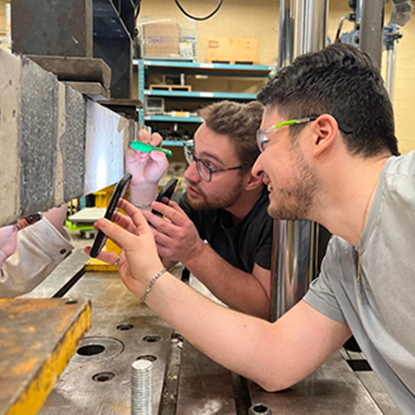 students doing beam testing