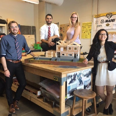student team with house design
