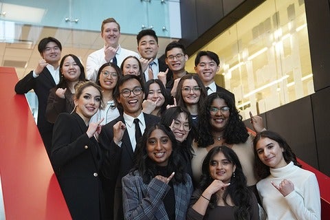 Group of AE students with their Iron Rings