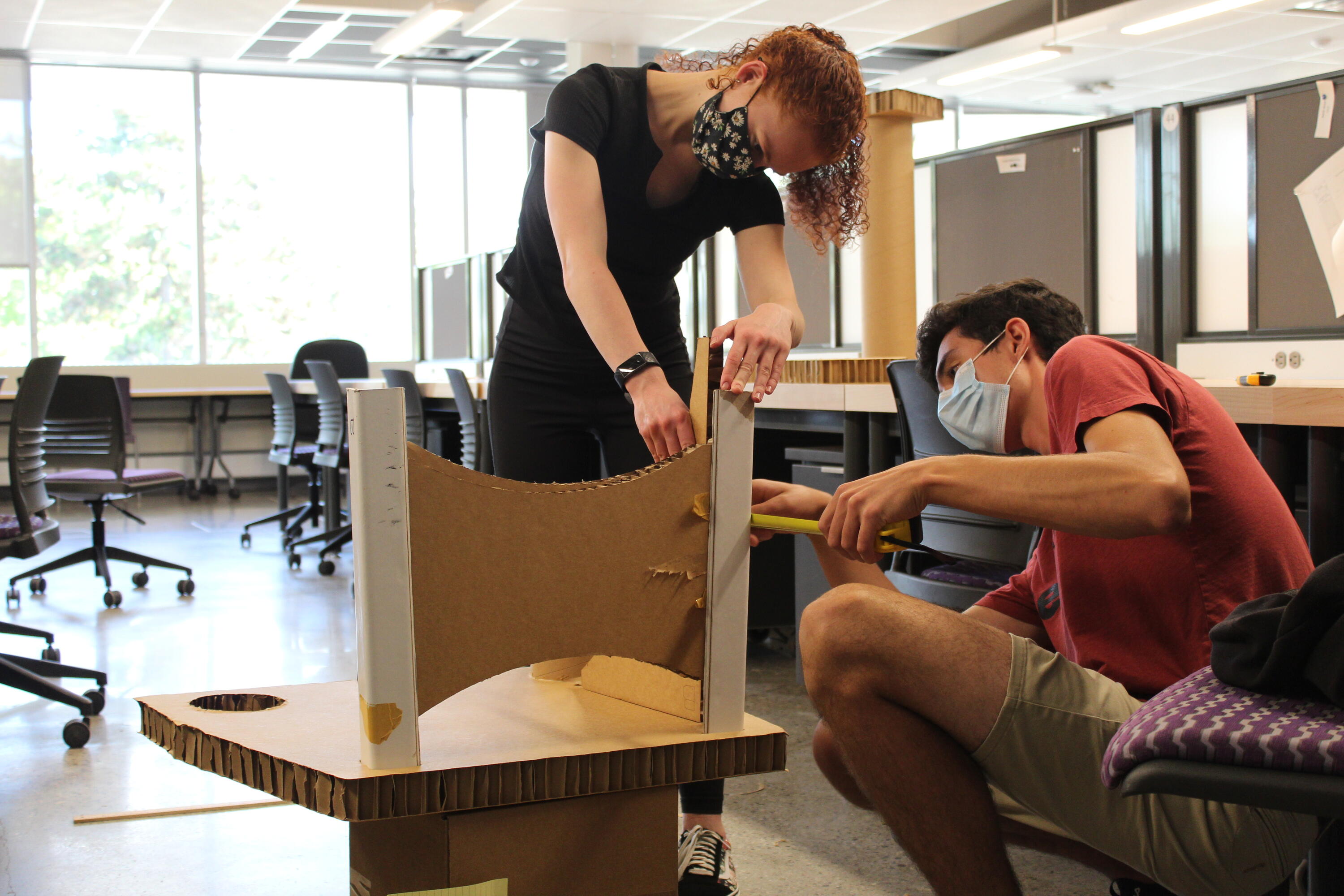 students building a cardboard chair