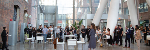 O'Donovan Director Anne Bordeleau speaks to alumni in a large pavilion