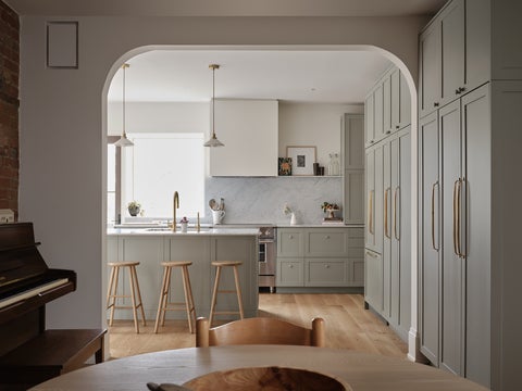 The opening between the kitchen and dining room at High Park Residence by DPO