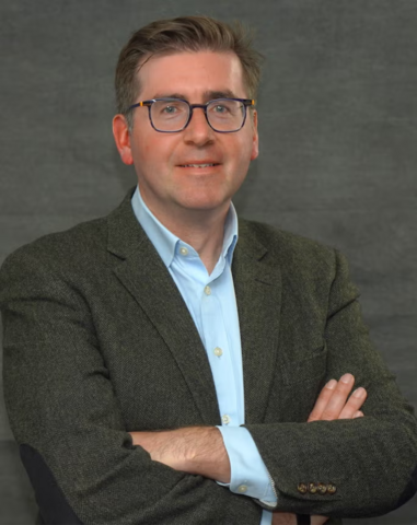 headshot of Brian Doucet