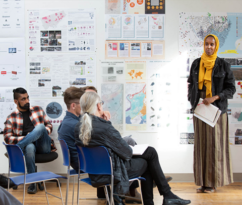 A student presents their thesis