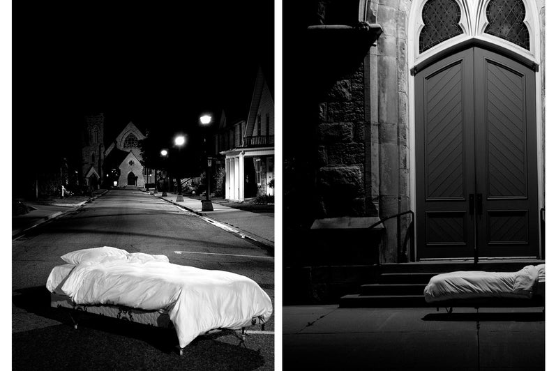 Two photographs of a mobile bed (with a pillow and sheets) laying in the middle of a public space at night. One is on a street.