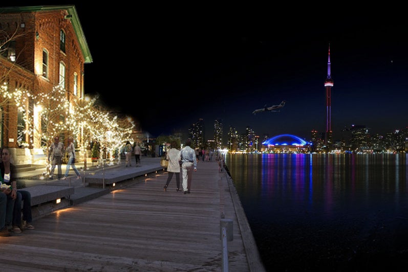 An exterior night render of the redesigned harbour. This is a image of the pedestrian pathway along the lake.