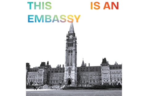 the canadian parliament buildings with the words this is an embassy on the top of the image