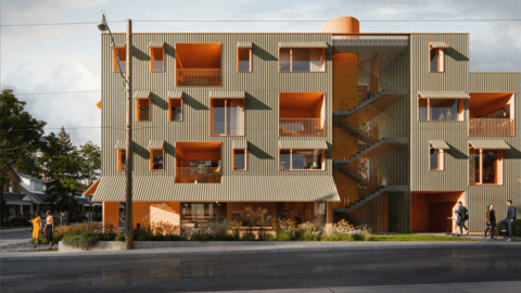 view across the street of a three story building with orange trim