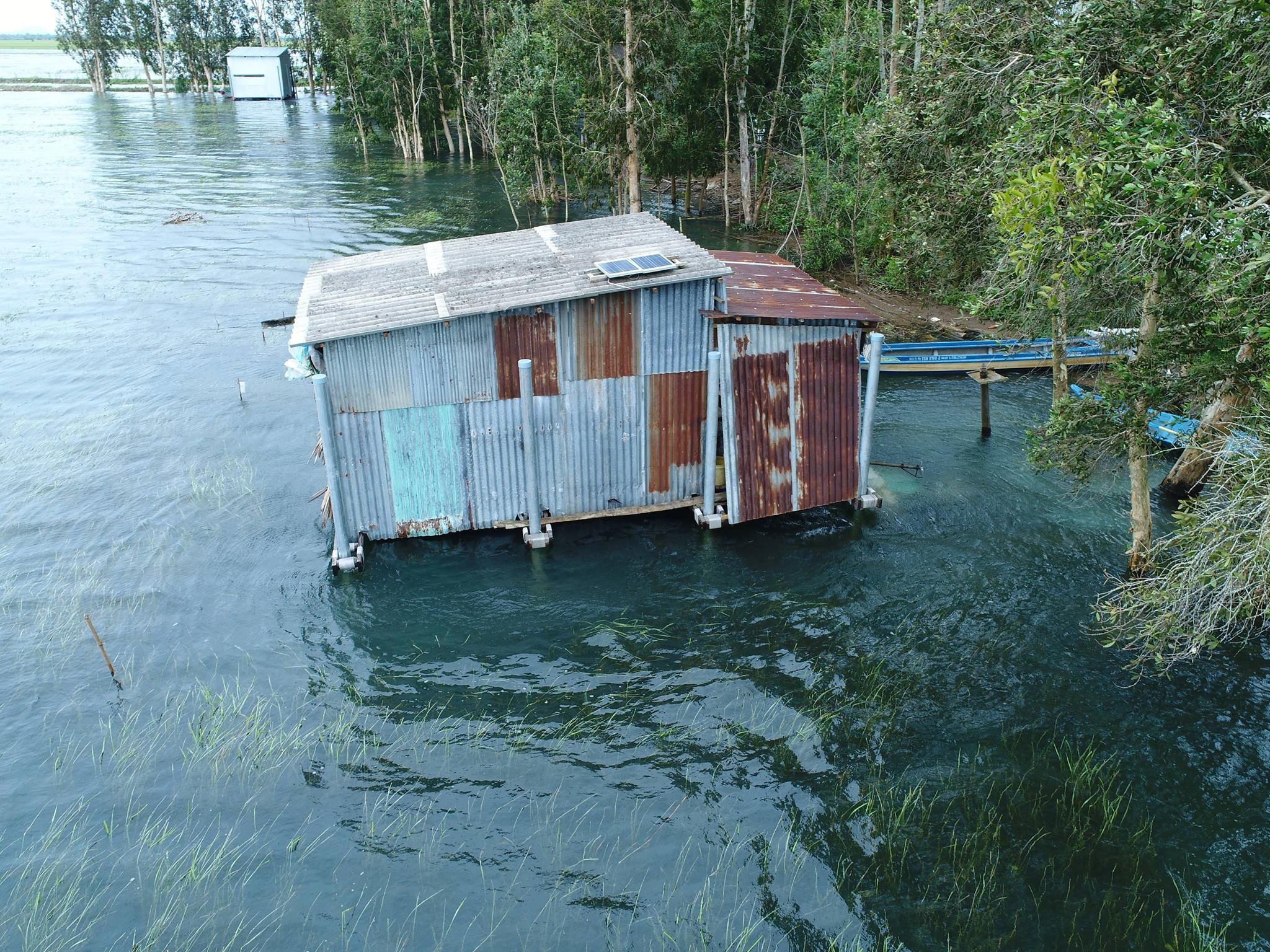 The second amphibious retrofit house in An Giang Province floating during the monsoon flood in 2018