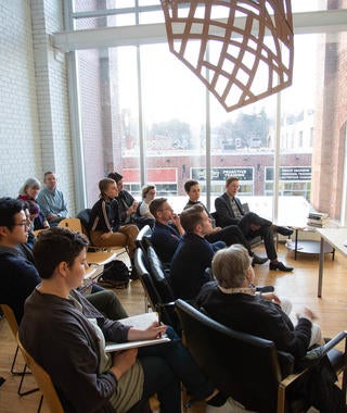 A thesis presentation in the 2nd floor atrium