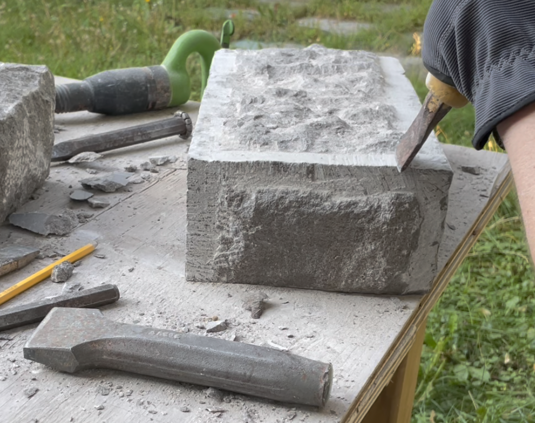 stone working with a chisel