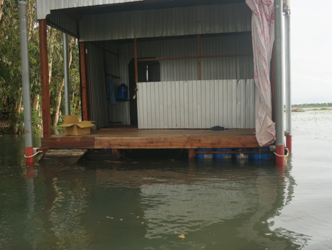Home floating on floodwater in Vietnam, August 21, 2018