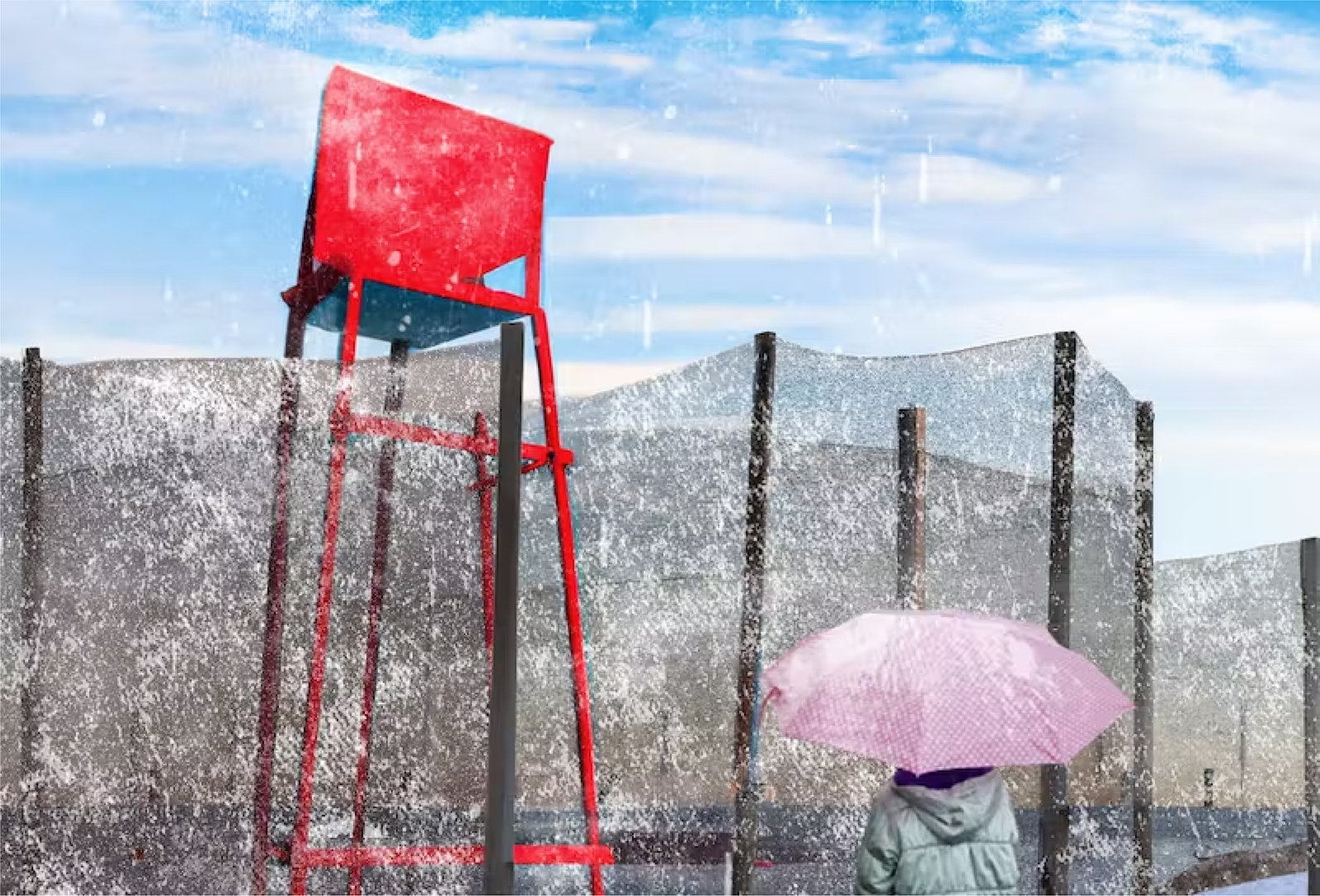 Person with a pink umbrella looking at an art installation based around a lifeguard's chair