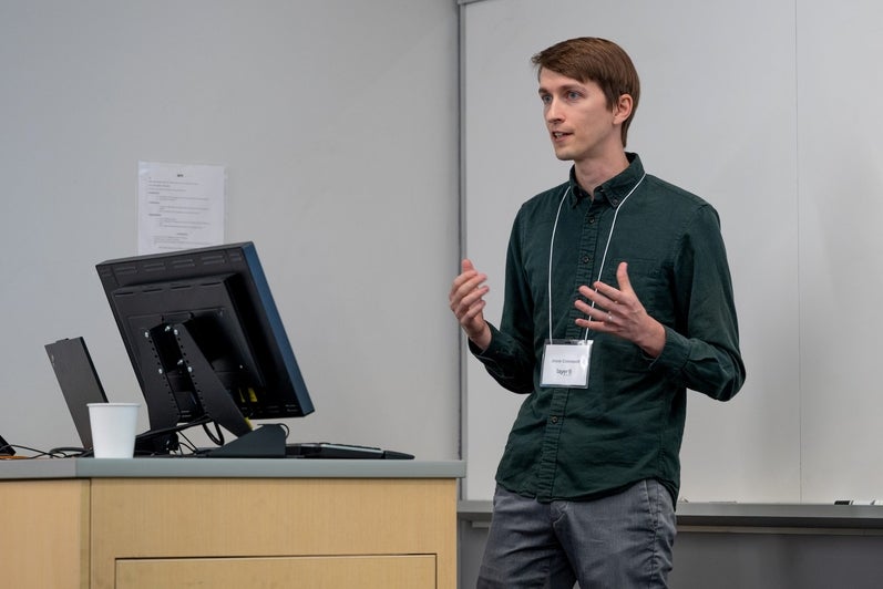 A faculty member presents his research during the TD Layer 6 visit