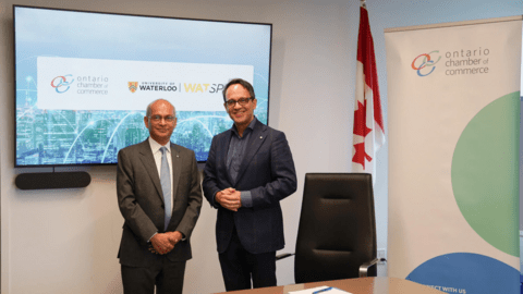 Waterloo president Vivek Goel and Ontario Chamber of Commerce president Daniel Tisch pose following the signing of an MOU