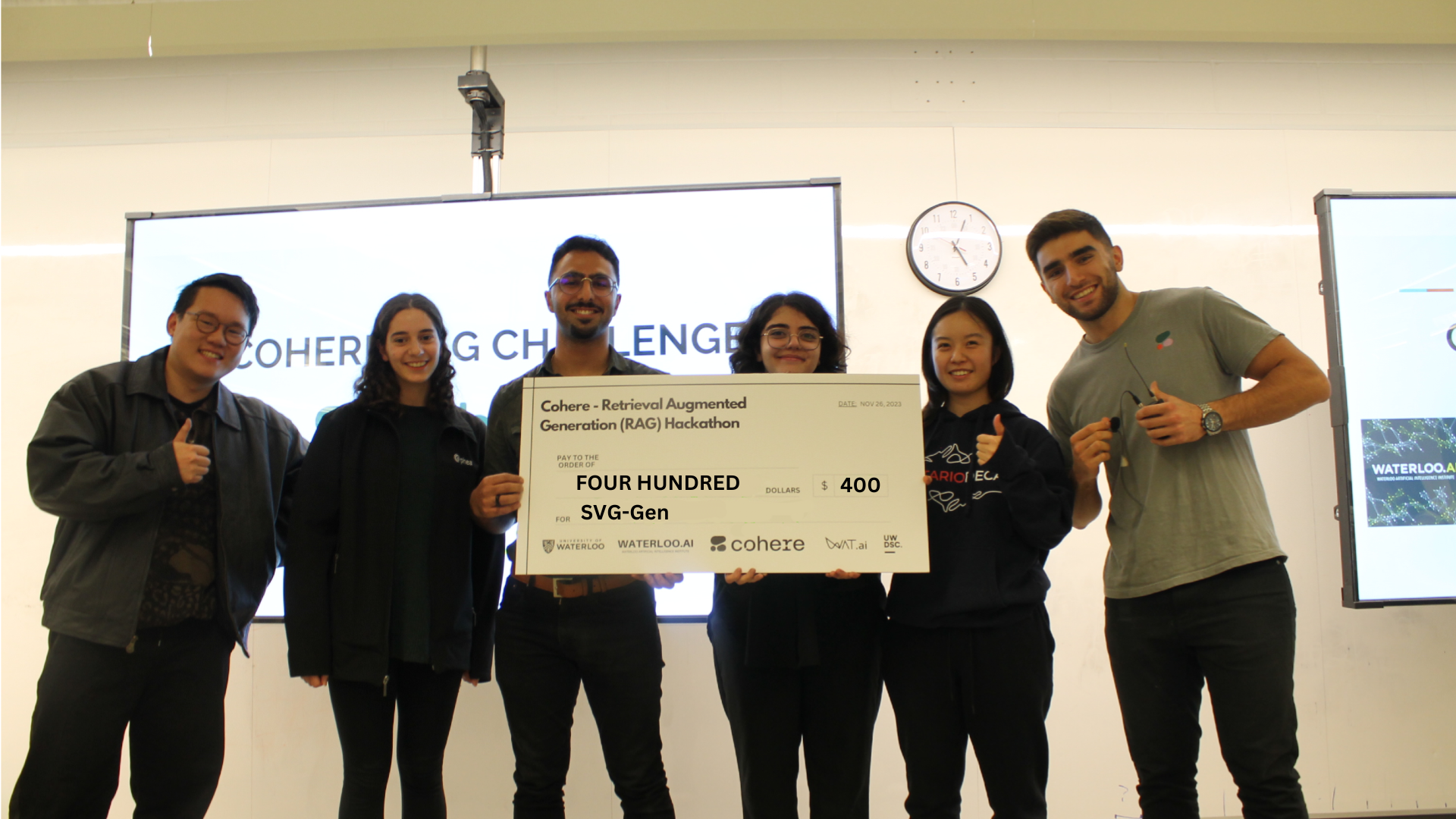 The SVG-gen team (L-R: Olivia Markham, Ali Shariatmadari, Paniz Ojaghi, Jillian Xu) holding a $400 cheque, flanked by Ivan Zhang and Faraz Khoubsirat