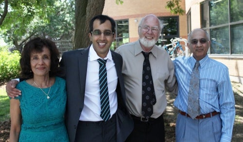 Vivek with parents and Francois Pare