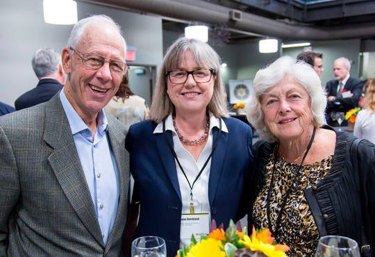 Dennis and Elizabeth Huss with Nobel prize winner Donna Strickland