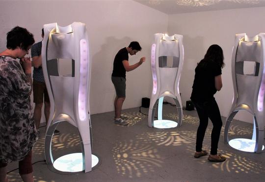 people interacting with anyWare sculpture installation