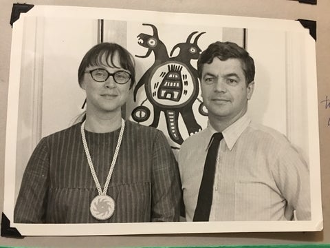Nancy-Lou and Palmer Patterson in front of Indigenous artwork in the 1960s