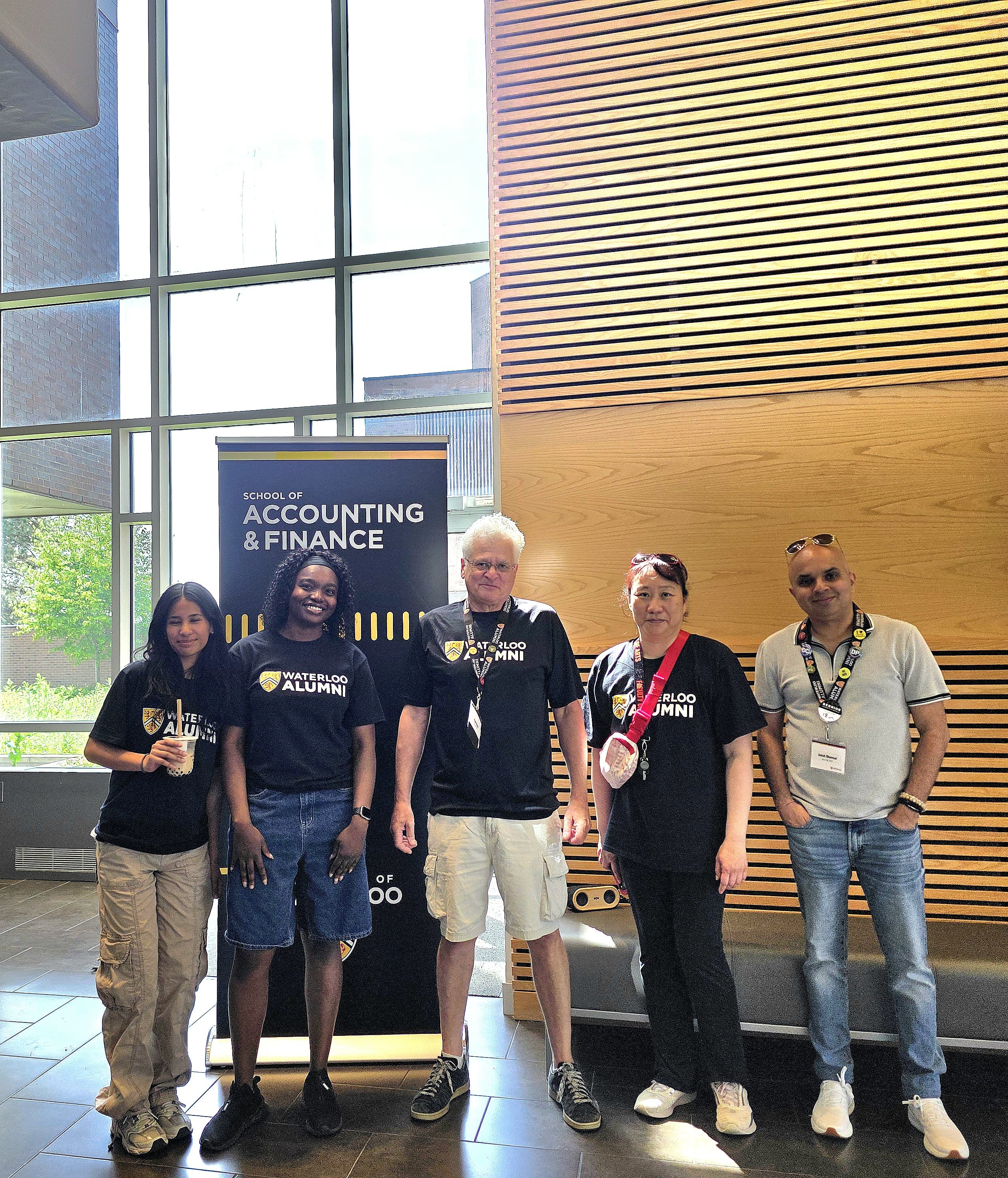 Paul Moser with Phoebe Wong and Anish Bhavsar with Arts students in Hagey Hall