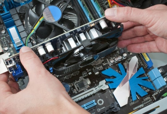 Man taking parts out of a PC