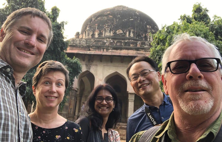 Doug Peers and four colleagues in fron tof temple in India