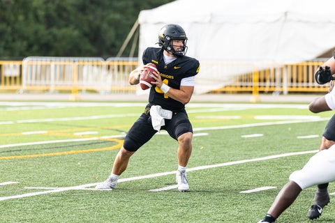Nick Orr holding football