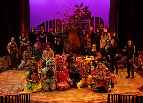 the cast in their animal costumes on stage inthe Theatre of the Arts