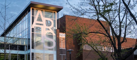 Close up of the Arts sign on the Hagey Hall Hub, seen at dusk