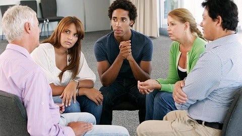 Young people in a group therapy session