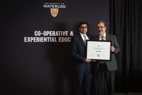 student Adnan Khan with President of Waterloo