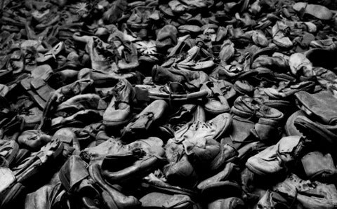 huge pile of old leather shoes