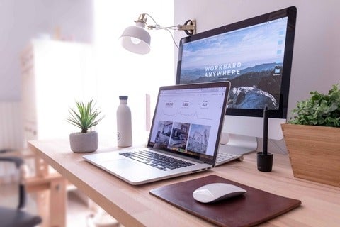 laptop and desktop on desk