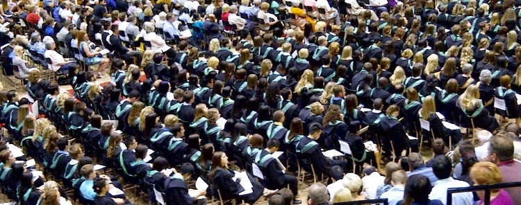graduates in robes at convocation