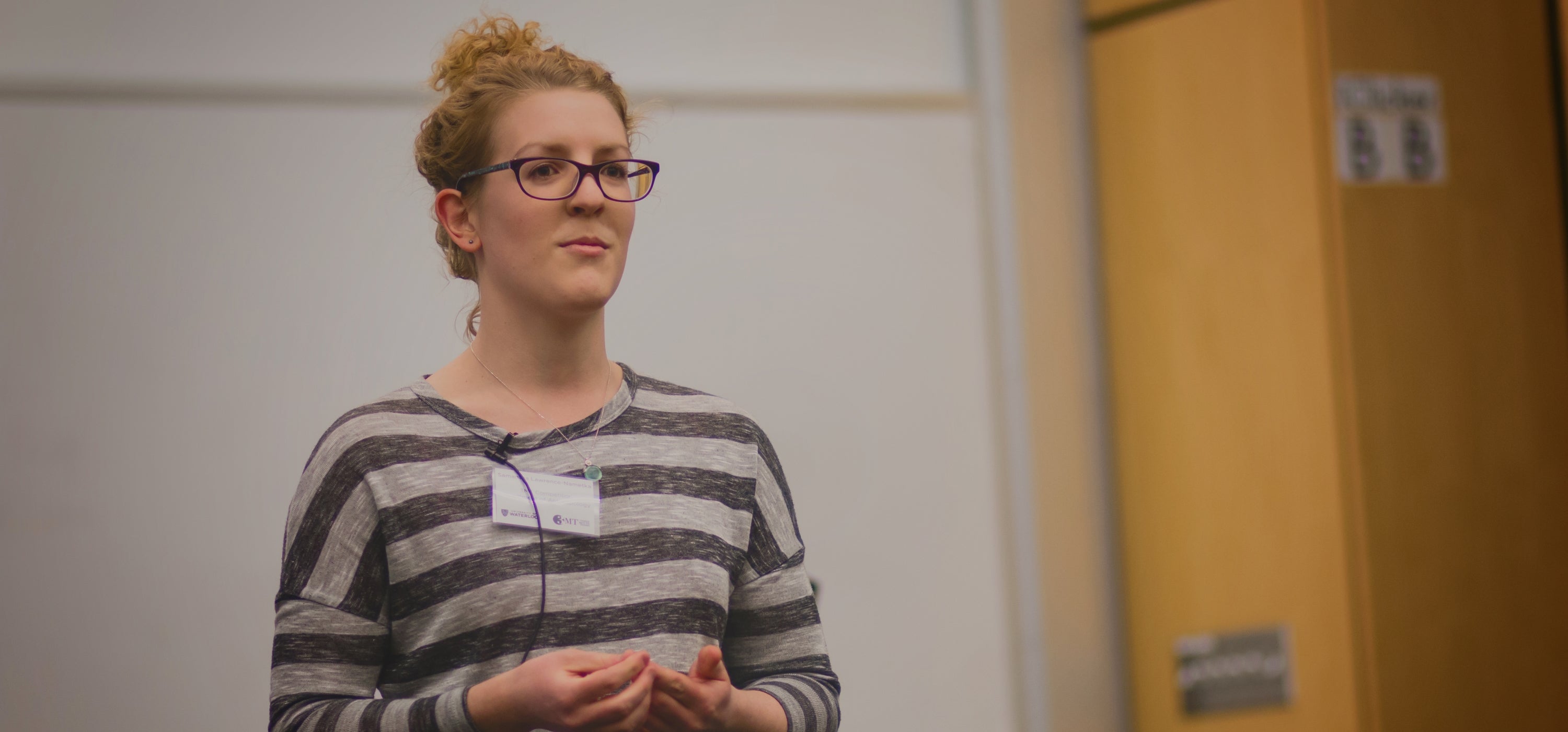 female student presents three minute thesis