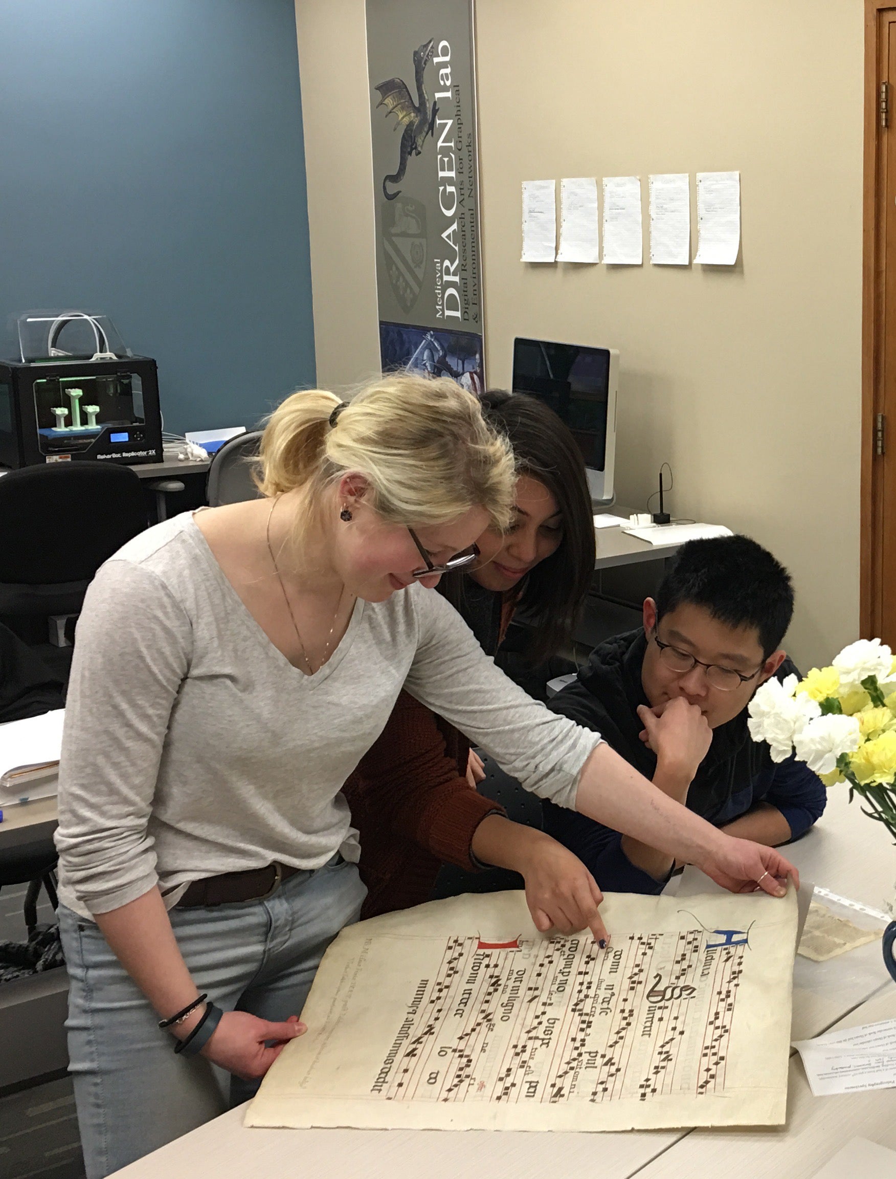 students examine medieval script in lab