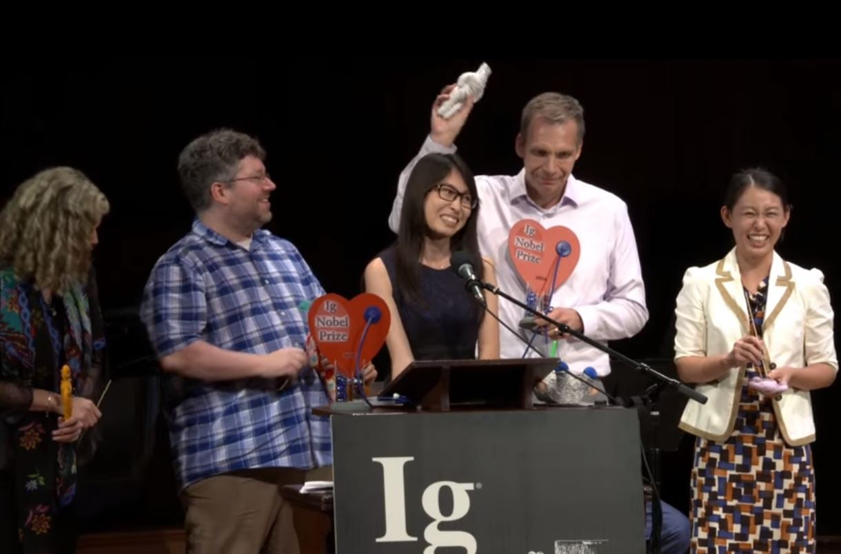 Lindie Liang, Doug Brown and colleagues on stage