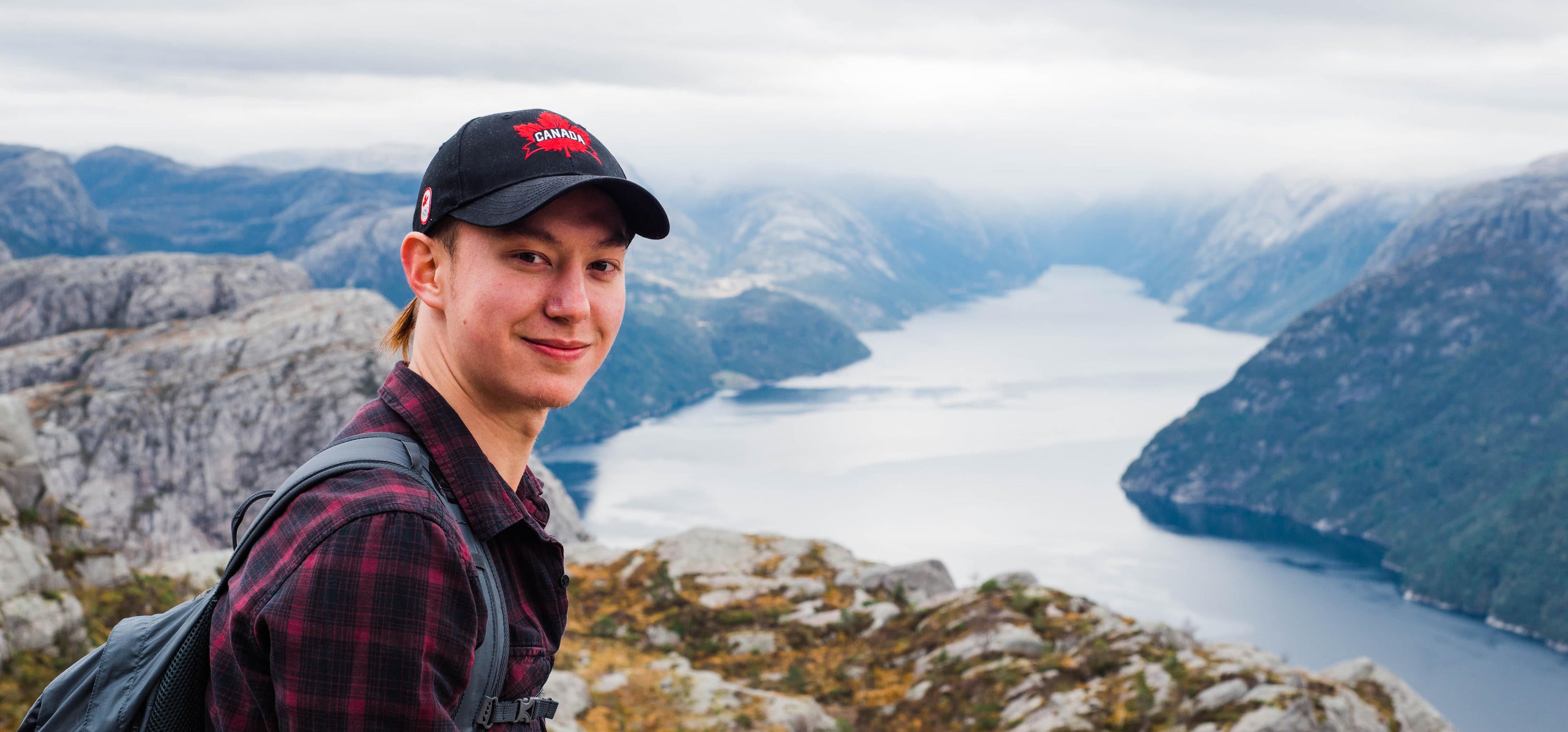 Jonathan Choo hiking above Norway fyords
