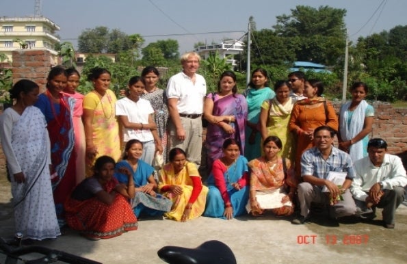 Philip Tanner with a group of villagers in Nepal