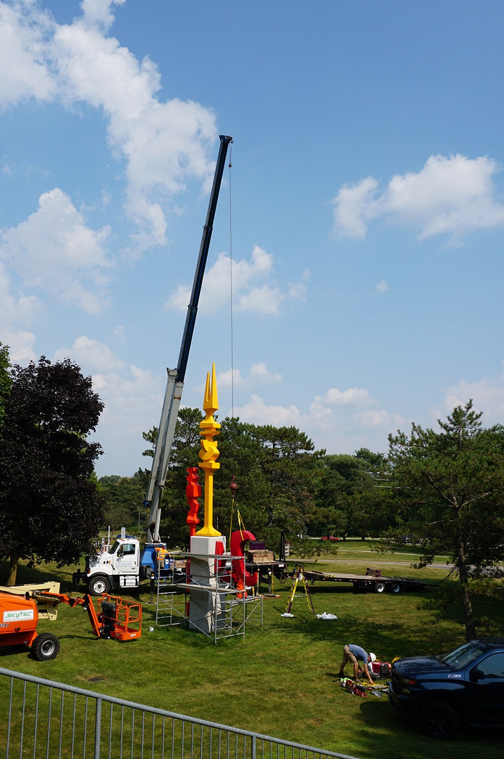 A large crane being used to install the sculptures