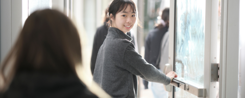 AFM student walking out the door