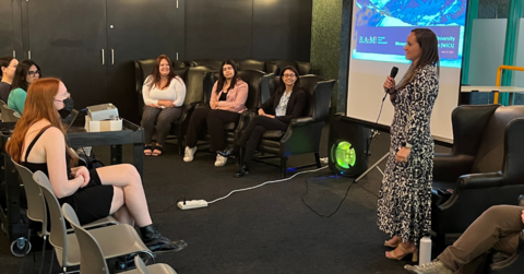Hannah Dinardo, head of campus recruiting at BAM, speaks to the attendees of the fireside chat on May 24, 2023 in the Davis Centre.