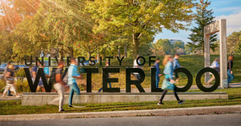 University of Waterloo sign on campus in the fall
