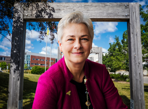 Norah McRae, Associate Provost of CEE at the University of Waterloo infront of the Tatham Centre