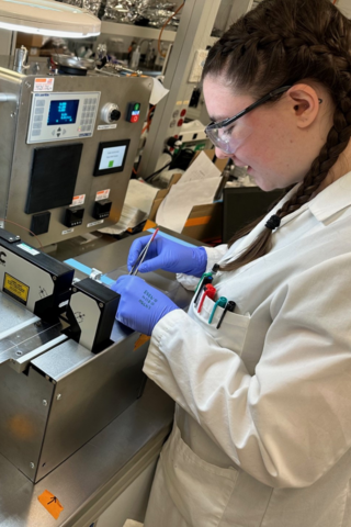 Waterloo co-op student working with Ripple Therapeutics tech while on work term