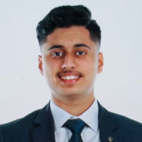Business photo of Sahil in a tie