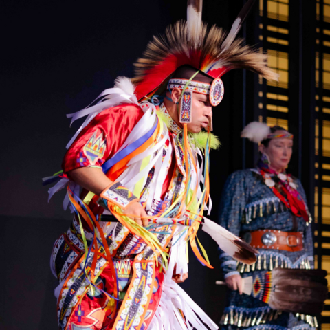 Indigenous elder dancing